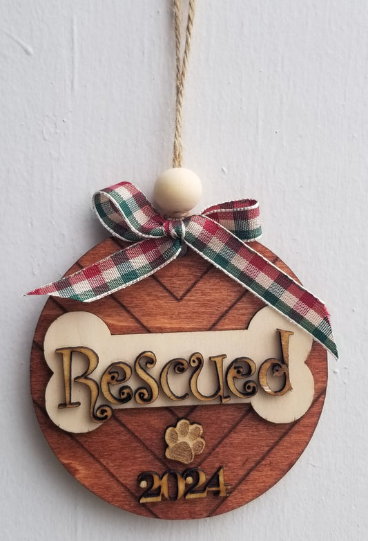 A Holiday Ornament "Rescued", "Dog Mom" or "Dog Dad"